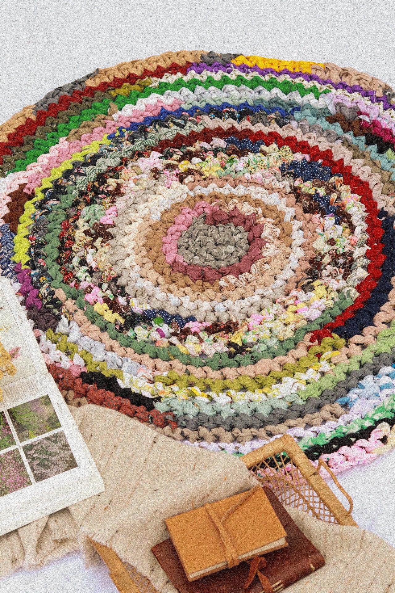 Crocheted offers round multi colored rag rug.